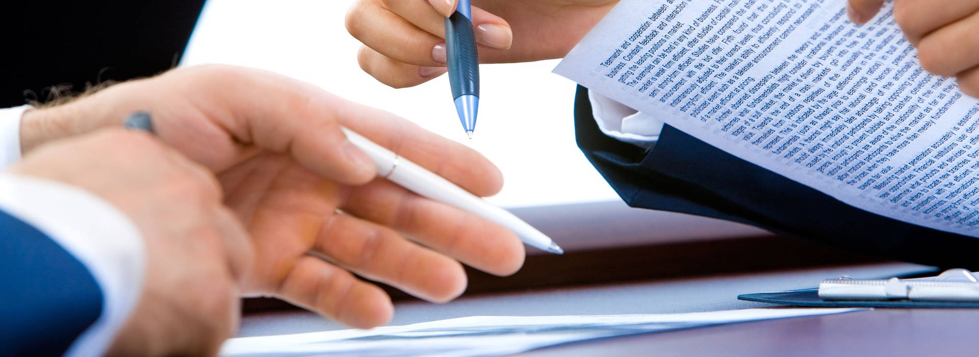 Caliper measuring a coin of money against the background of an accounting document.